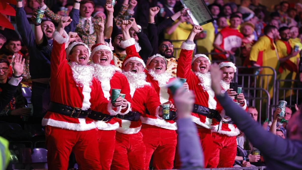 Darts fans dressed as Santa Claus